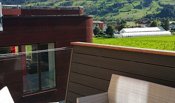 View to the Tyrol mountains from the balcony, and the balcony furniture