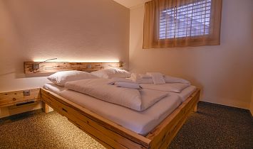 Hier lässt es sich kuscheln - in den gemütlichen Schlafzimmern der Tradition Appartements von SUN Matrei
