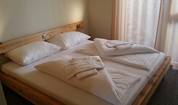 Enjoy a wonderful slumber in the bedrooms which have lots of traditional wood elements