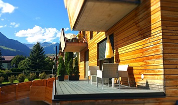 Fantastic view to the mountains in Tyrol from the balcony of the Tradition apartment Large