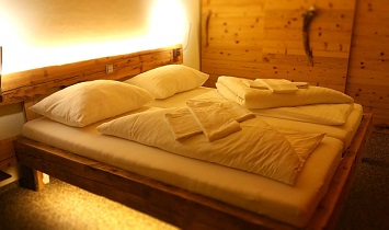 Snuggle up - in the cosy bedrooms in the Tradition apartments in SUN Matrei